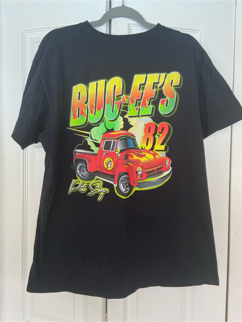 Black Short-Sleeve Graphic Crewneck T-Shirt with Small Colorful Chest Patch